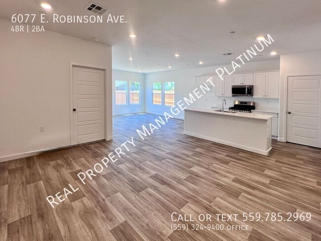 Building Photo - 6077 E Robinson Ave
