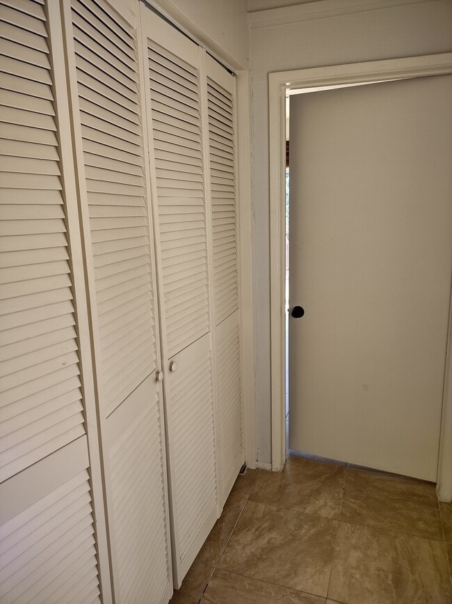 Doors to the washer and dryer. - 2142 S Victoria Ave
