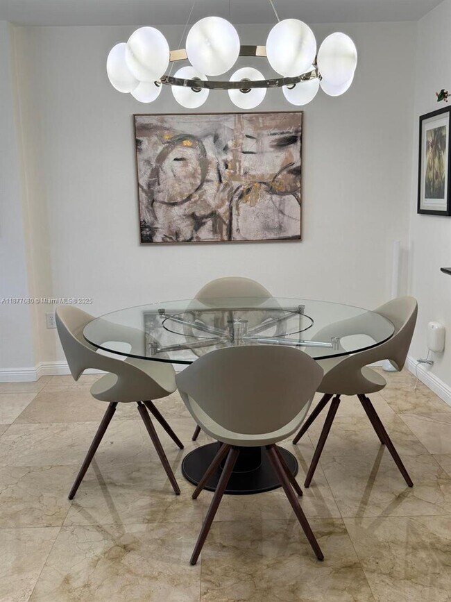 Building Photo - 10275 Collins Ave