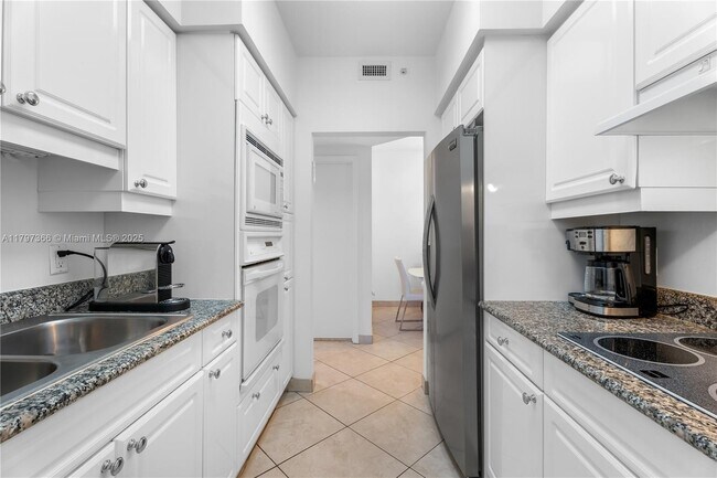 Building Photo - 4779 Collins Ave