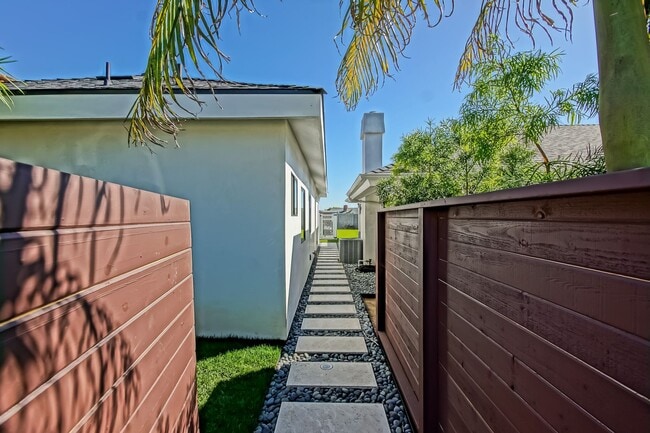 Building Photo - Beautifully Remodeled, Bright & Modern 4BR3BA Home w/ 2BR1BA Guest House On Sprawling Corner Lot ...