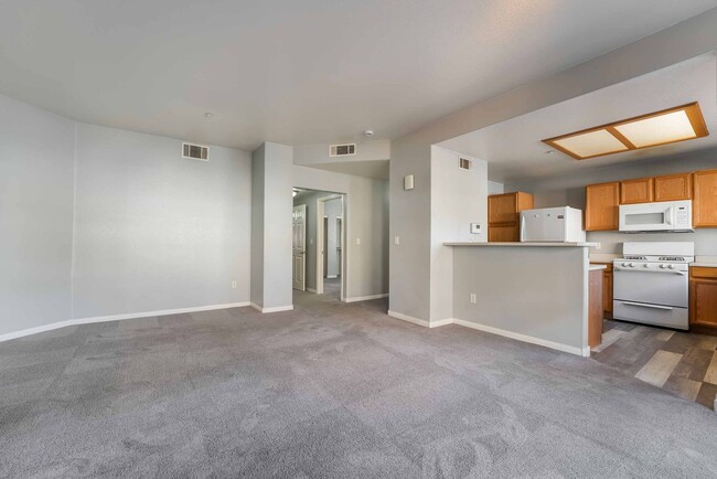 Building Photo - Stylish 1st-Floor Condo in Gated Community!