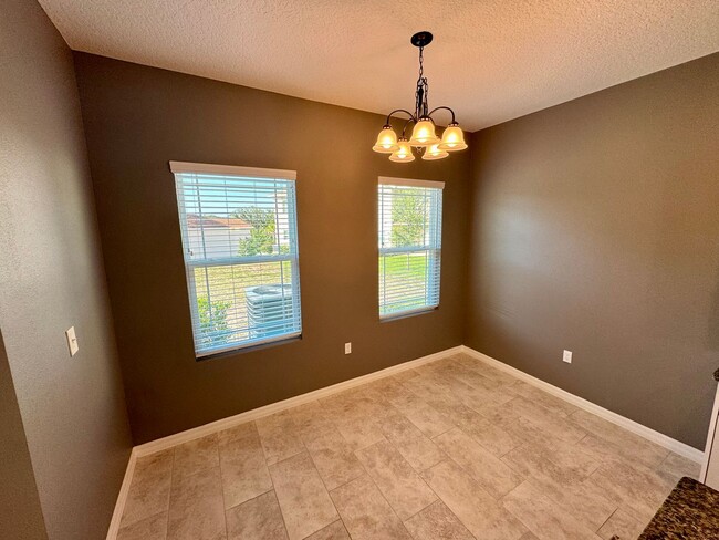 Building Photo - Move in ready 3/2 New Construction Townhou...