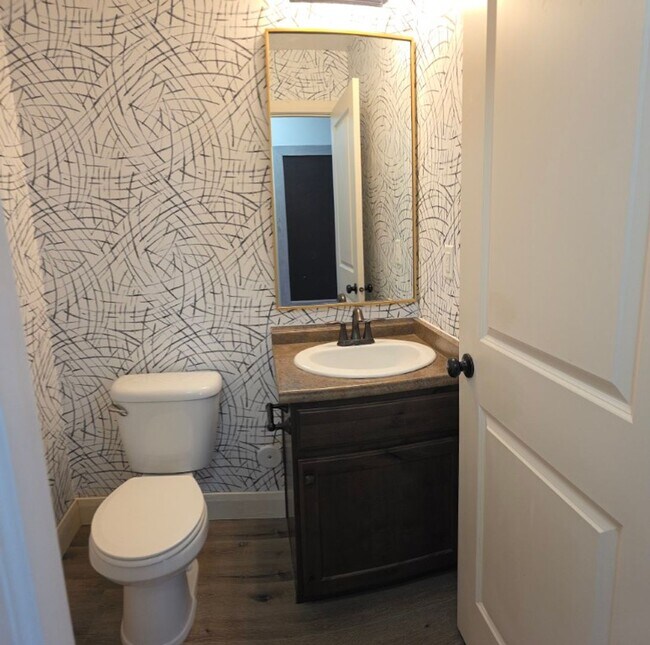 Building Photo - Spacious 4-Bedroom Home in Highly Sought-After Summerfield Community!