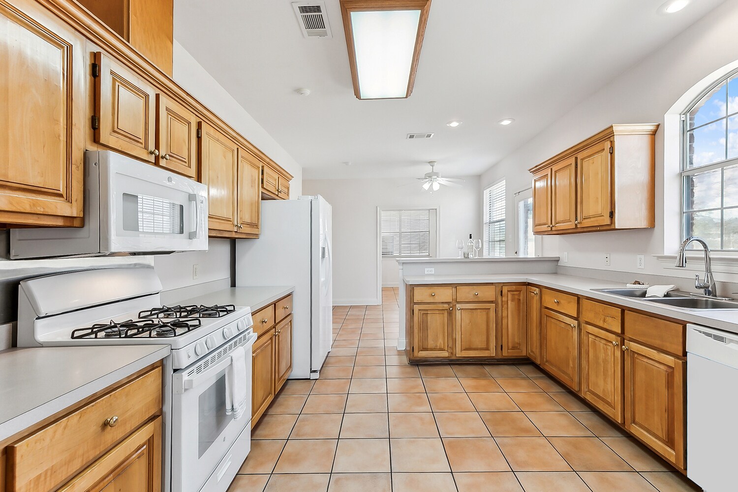 Large kitchen with tons of storage, pantry, new microwave/dishwasher/refrigerator - 3245 Iowa Ave