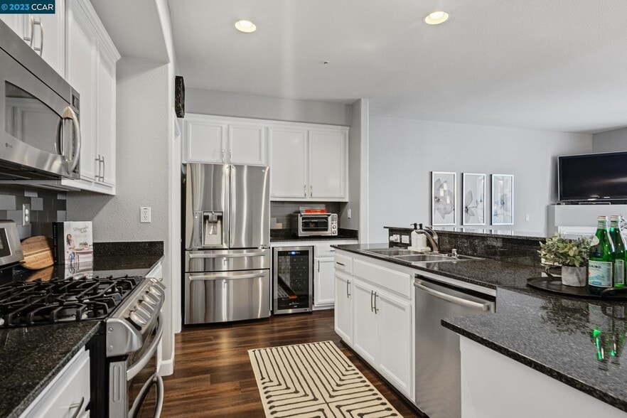 Kitchen with wine refrigerator - 4323 Clarinbridge Cir