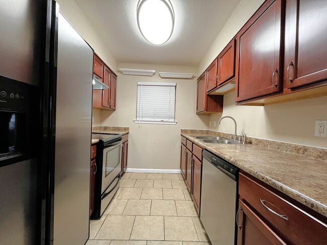 Building Photo - 1st Month Rent Free! Absolutely darling, fully remodeled, single story, updated condo in a NE Hei...