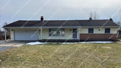 Building Photo - Peaceful 3-Bedroom Home in a Wooded Rockford Neighborhood