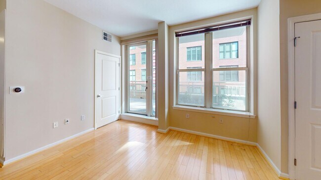 Building Photo - Spacious One Bedroom Plus Den W/MASSIVE Private Balcony Available Now!