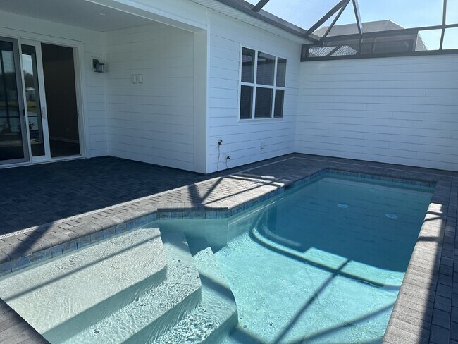 Building Photo - Gorgeous Home with a Private Pool Ready to...