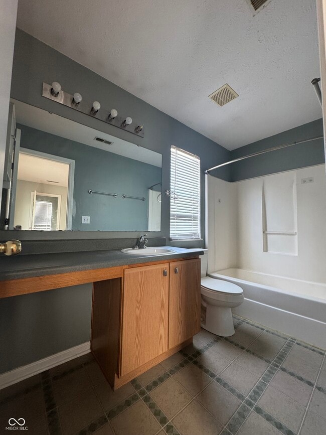 Building Photo - 7308 Wellwood Dr