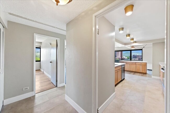 Building Photo - Stylish Imperial Plaza Condo in Prime Downtown Location
