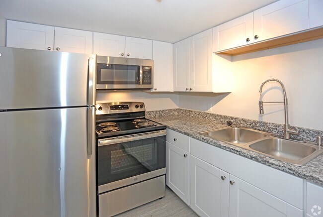 2X1.5 878SQ KITCHEN - Sun Ridge Apartments