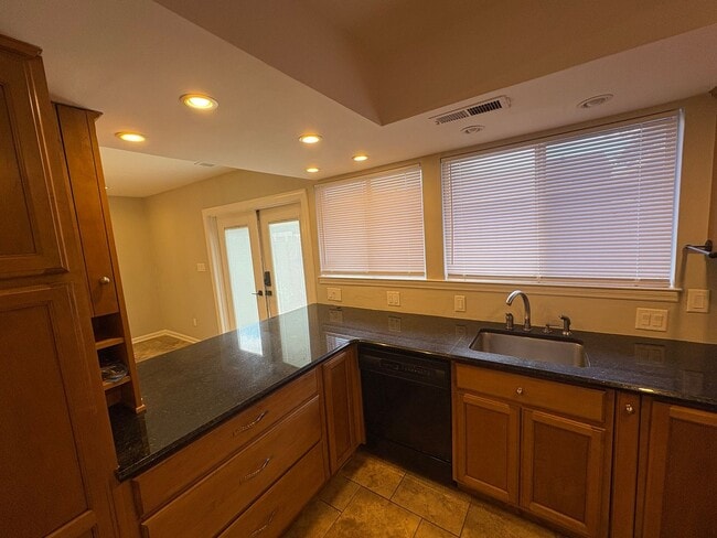 Building Photo - Four Bedroom Townhome Available Now