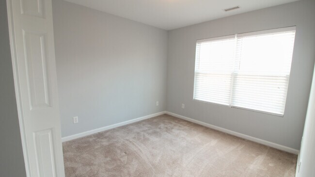 Building Photo - Location, Location, Location! Fantastic 3/2.5 Townhome in the Heart of RTP!