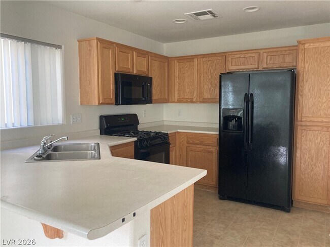 Building Photo - 9519 Milkweed Canyon Ave