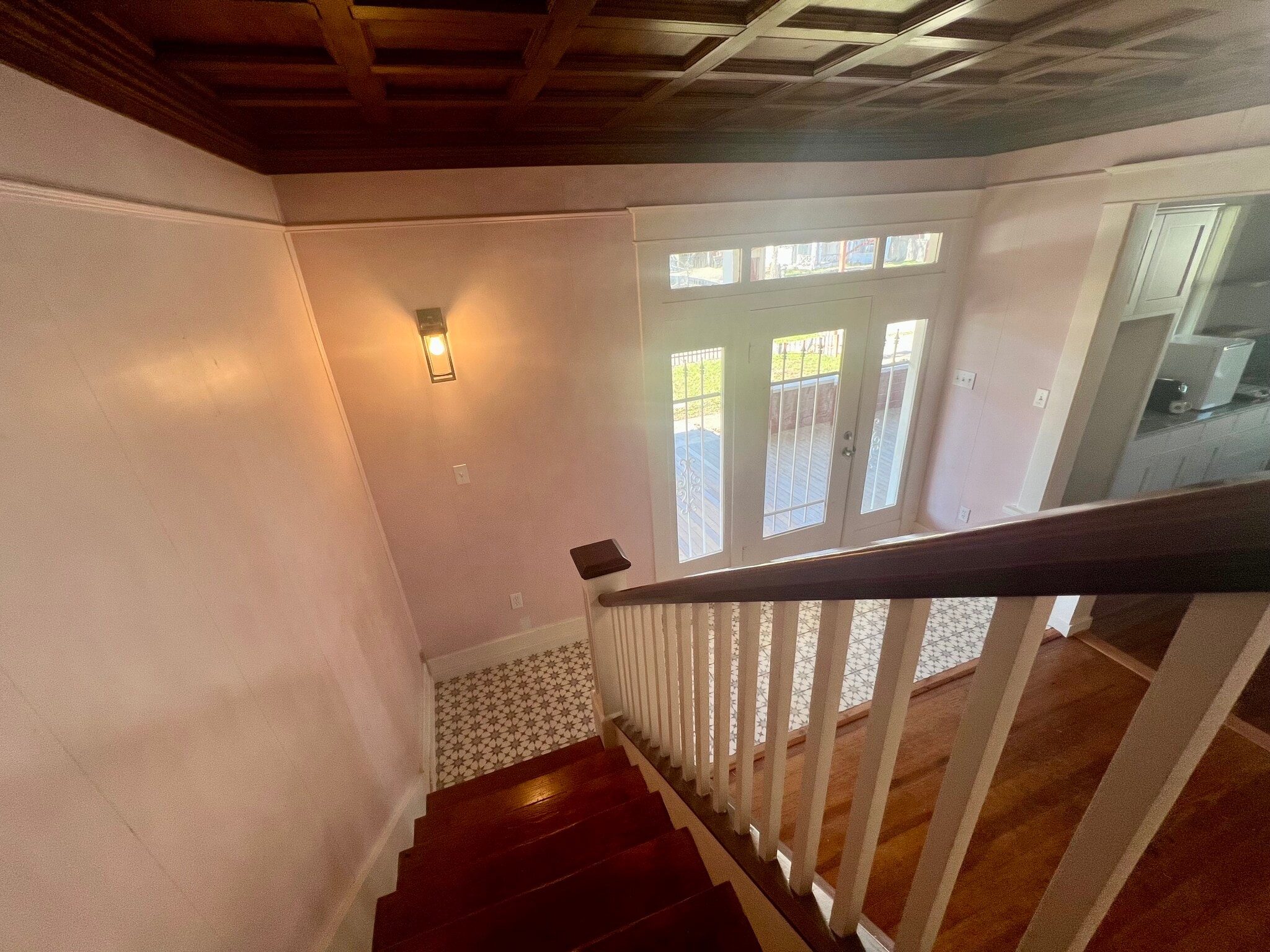Looking down the stairs to front foyer - 2115 Johnson St