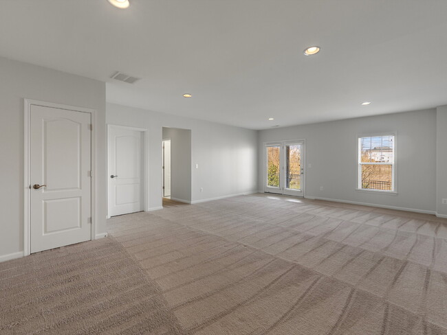 Building Photo - This home offers an open floor plan with s...