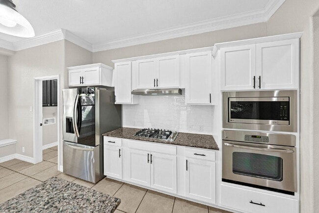 Building Photo - Corner Homesite. Gated Community. 4 Bedroom 1 Story with Formal Dining and Formal Office