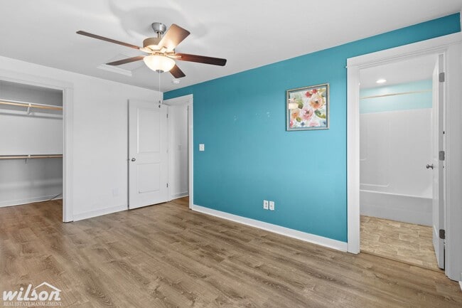 Building Photo - Welcome Home: Big Yard, Garage, and Pets A...