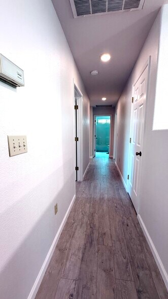 Hallway to Bedrooms - 12961 Burnt Cedar Ln