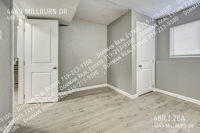 Building Photo - Four bedroom home close to Ft. Carson, Lar...