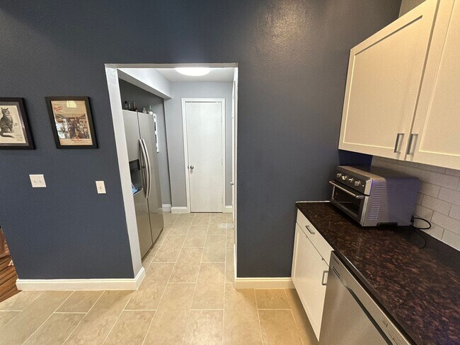 Building Photo - *COMING SOON* Updated Home Near Downtown – EV Charger, Office & Outdoor Oasis!