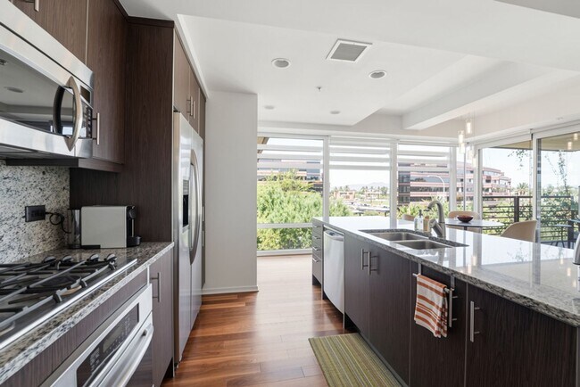Building Photo - Luxury Corner Unit with Panoramic Mountain Views at Optima Camelview!