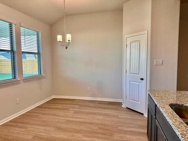 The dining area is conveniently located right off the kitchen! - 507 Turtle Dove Dr