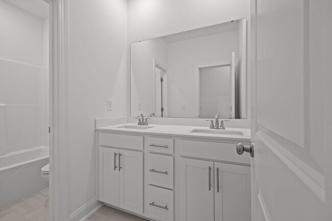 Building Photo - Brand-New 5BR/4BA in Knightdale’s Stoneriver – Luxury Living with 3-Car Garage