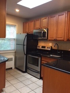 Building Photo - Sunny 1BR/1BA Top Floor Condo in Takoma Park