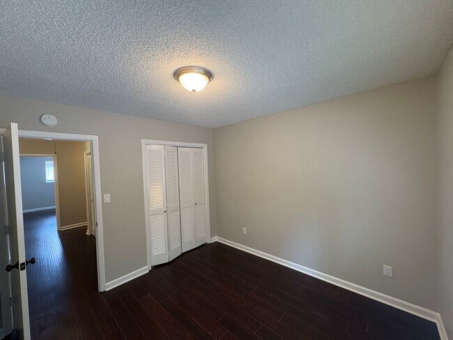 Building Photo - Four Bedroom Townhome Available Now