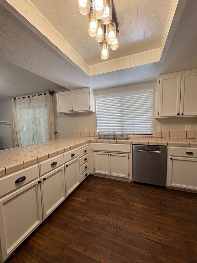 Building Photo - Your Private Escape – Charming Ranch-Style Home with Room to Breathe!