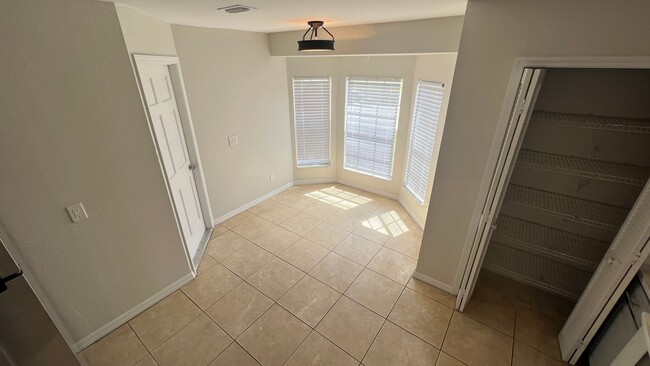 Building Photo - Bright & Spacious 3/2 Home with Huge Yard + Screened Patio — Lawn Care Included!