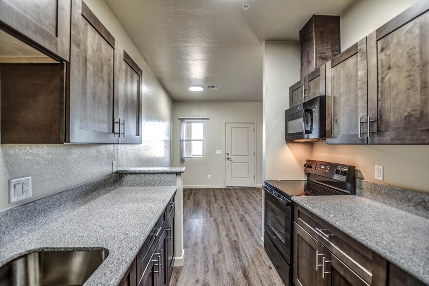 View into apartment out of kitchen - 230 N Winchester Rd