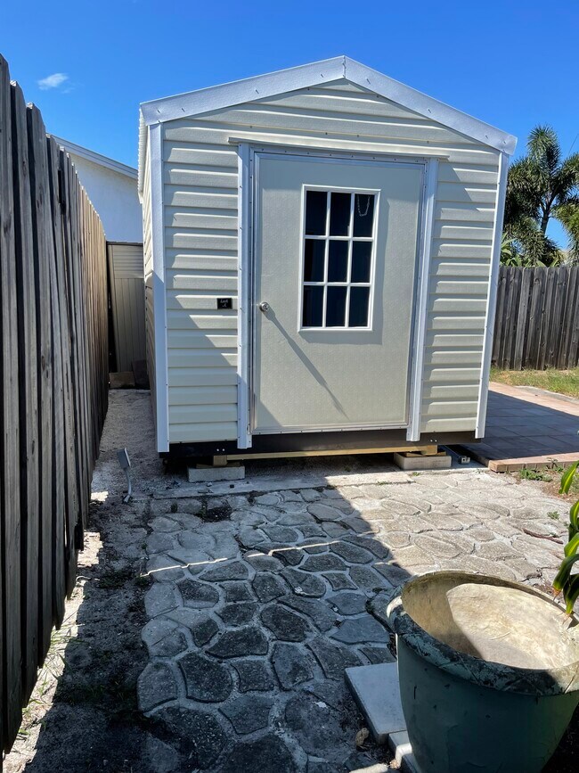 And a brand new storage shed with electrical! - 7669 SE James St