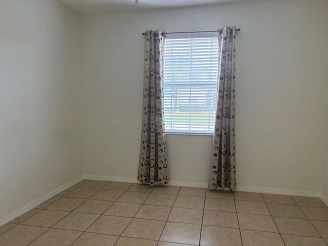 Building Photo - Water View 4/3 in Wyndham Lakes Estates near Lake Nona Medical City and O.I.A.