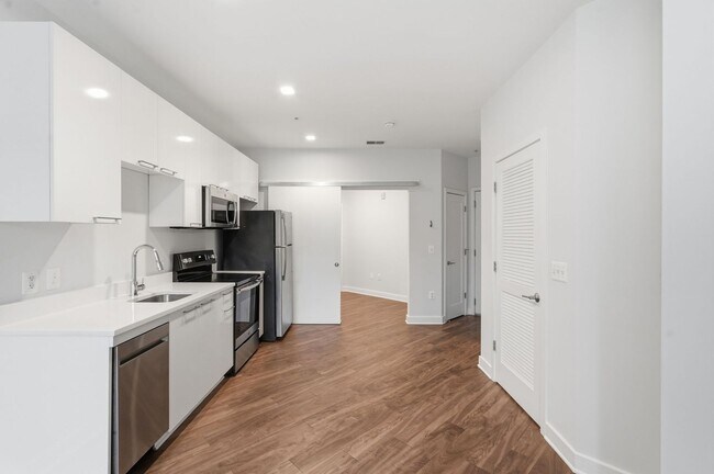 Building Photo - Experience modern living in this beautifully appointed junior one-bedroom/studio featuring an ope...