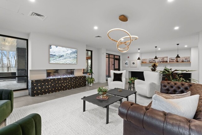 Building Photo - Spacious 1-Bed, 2-Bath + Den with Lake Vie...