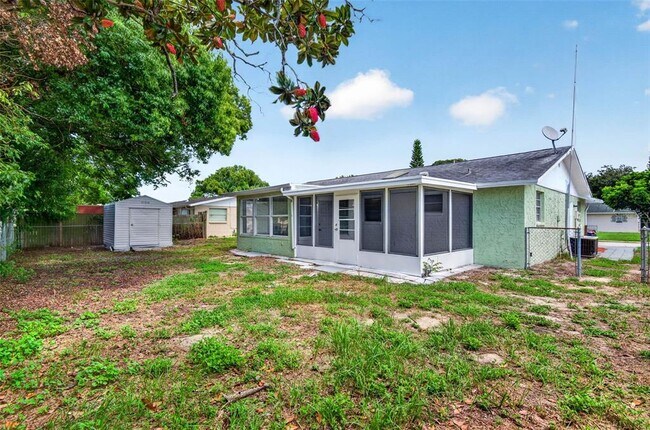 Building Photo - 8905 Tropical Palm Way