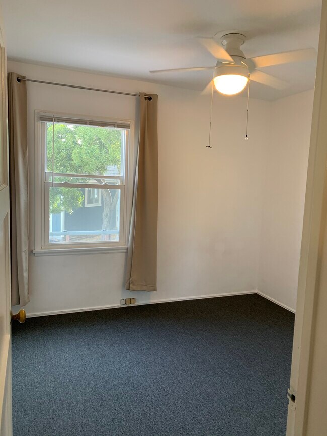 2nd Bdrm 1 Blinds/room darkening drapes - 1827 18th St