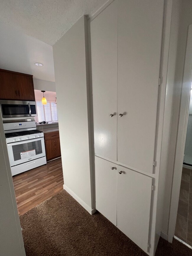 Building Photo - Private Back House with single garage & yard