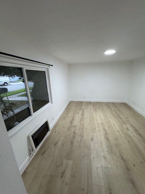 Building Photo - 8402 Larson Ave