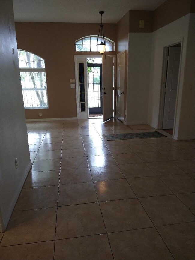 Building Photo - 6444 NW Hacienda Ct