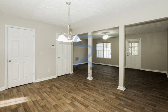 Building Photo - Move in before February 28th and choose your reward: a $250 Amazon Gift Card or a 55" Smart TV!