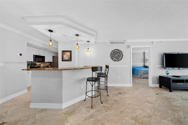 Building Photo - 6917 Collins Ave