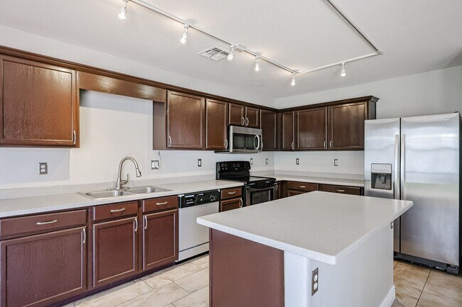 Building Photo - COMING SOON !! Amazing 5 bedrooms and bathrooms in one of the best school districts!