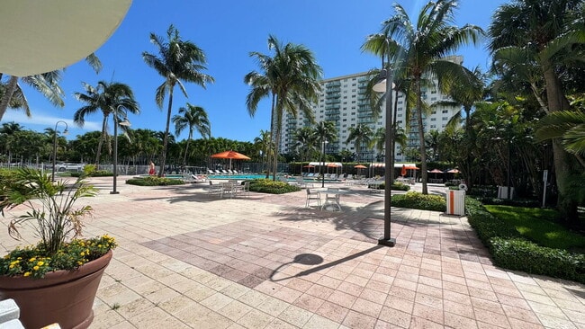 Building Photo - 19380 Collins Ave