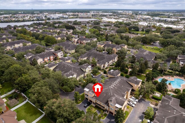 Building Photo - IMMACULATE 2nd Story condominium with so m...