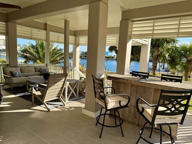 Building Photo - Waterfront Shell Point Home with Dock, Hot Tub, Elevator, & Golf Cart